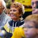 A Michigan fan smiles during the Michigan Alumni Association pep rally at the Renaissance Atlanta Waverly Hotel in Atlanta on Friday, April 5, 2015. Melanie Maxwell I AnnArbor.com